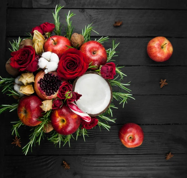Fruit bouquet  with apples, roses and pomegranate.
