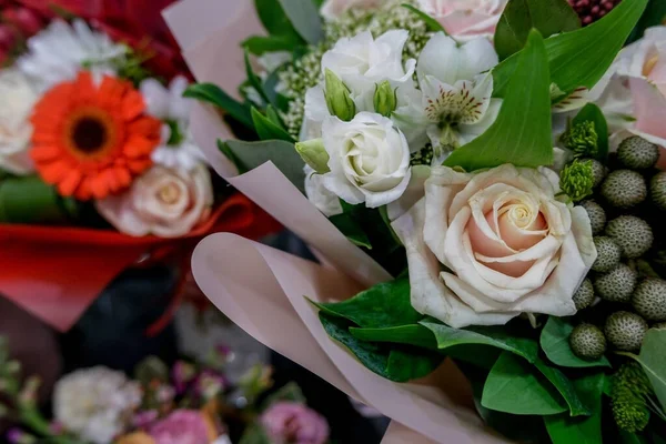 Beautiful bouquet of mixed flowers. Floral shop, flower market. Selective focus.