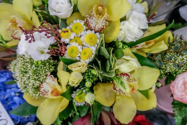 Beautiful bouquet of mixed flowers. Floral shop, flower market. Selective focus.