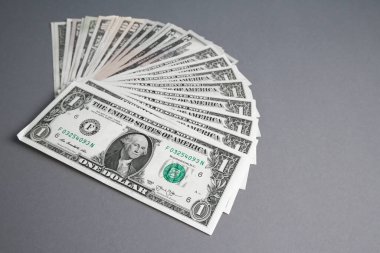 Amerikan banknotları duvar kağıdı. Paraları kapatın. Zenginlik kavramı, çevrimiçi kazanç, serbest çalışma.