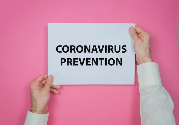 Mans Hand Houden Een Vel Papier Met Corona Virus Preventie — Stockfoto