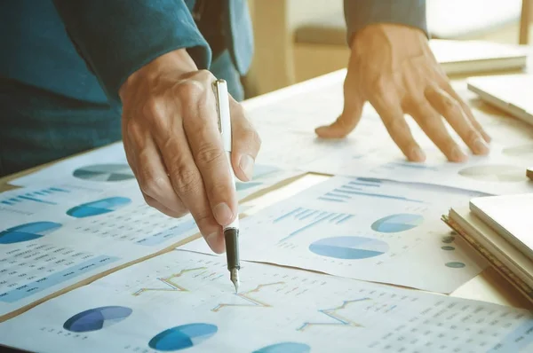 Business man pointing at business document. — Stock Photo, Image