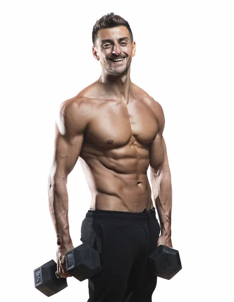 Gespierde bodybuilder bedrijf halters — Stockfoto