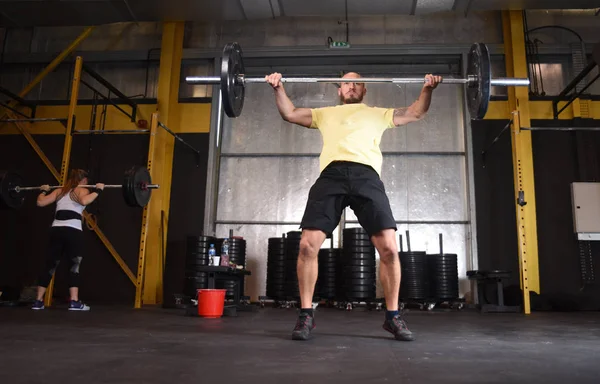 strong crossfit athlete with beard