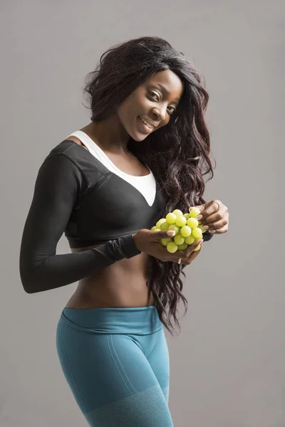 Premium Photo  Attractive black african american woman in leggings and top  fitness outfit