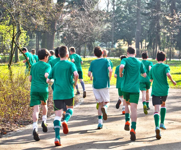 Boys from the football youth club exercising in the public park in Poland — Stock Photo, Image