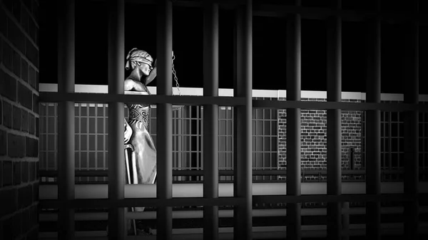 Prison bars and Lady of Justice 3d rendering — Stock Photo, Image