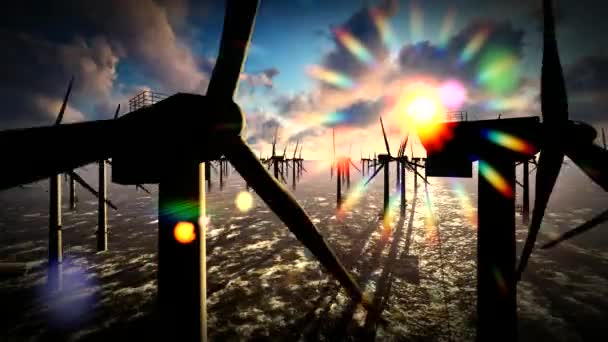 Cielos del atardecer sobre molino de viento turbinas offshore granja — Vídeos de Stock