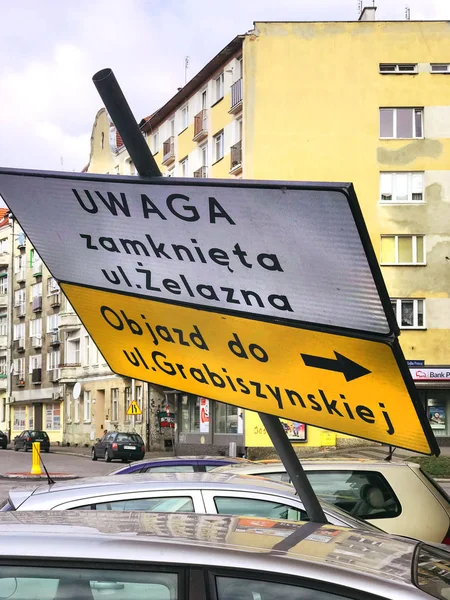 Sign Post Overturned Street Car — Stock Photo, Image