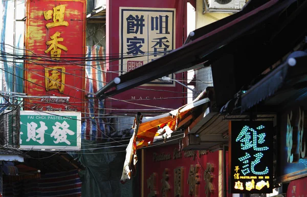 Crowded street with banners and signs — Stock Photo, Image