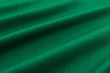 yeşil renkli lüks bez ya da dalgalı kıvrımları gibi grunge ipek saten kadife doku