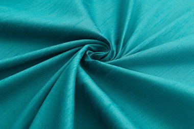 Turkuaz arka plan lüks bez ya da dalgalı ipek doku saten kıvrımları 