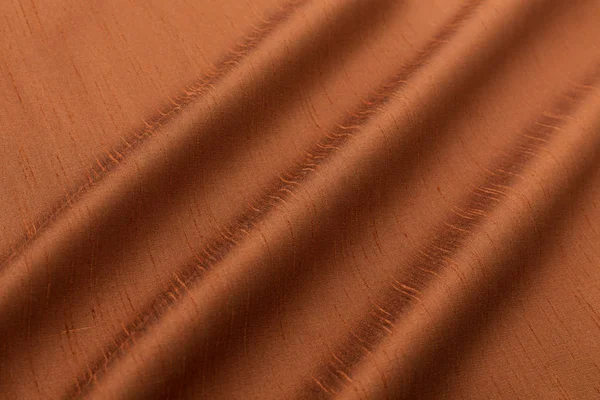 Coklat latar belakang kain mewah atau bergelombang lipatan kain kain sutra satin beludru — Stok Foto