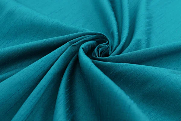 Бірюзовий фон розкішна тканина або хвилясті складки гранжевої шовкової текстури атласний — стокове фото
