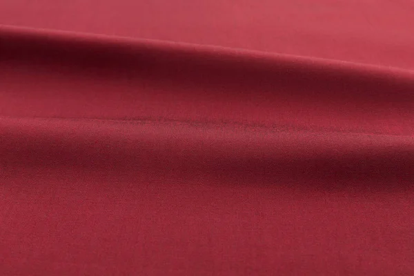 Červené pozadí luxusní hadříkem nebo vlnité záhyby grunge hedvábné textury Satén Samet — Stock fotografie