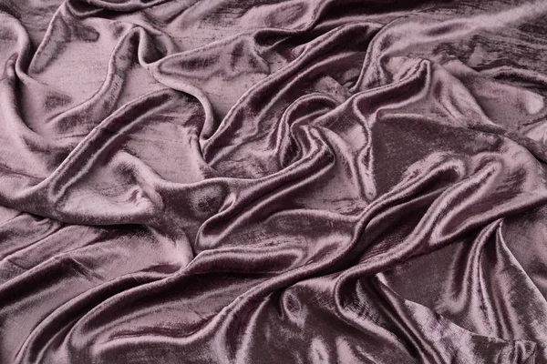Lilac velvet close-up. Fabric macro for texture and background