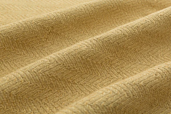Fundo amarelo pano de luxo ou dobras onduladas de seda grunge textura de cetim veludo — Fotografia de Stock