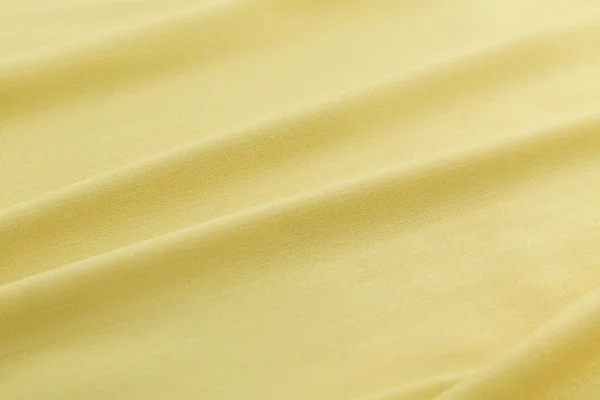 Gul bakgrund lyx trasa eller vågiga veck av grunge silk textur satin sammet — Stockfoto
