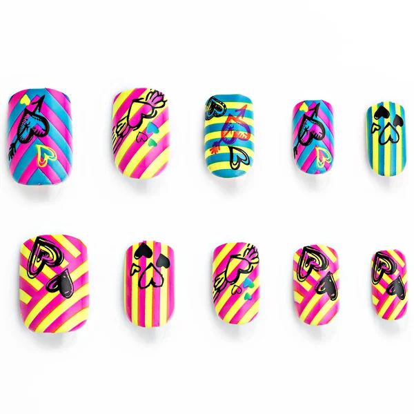 Conjunto de unhas falsas multicoloridas — Fotografia de Stock