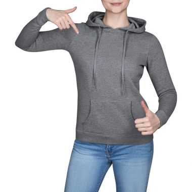 genç kız gri sweatshirt içinde başparmak yukarıya, hoodies gösterir. Beyaz arka plan