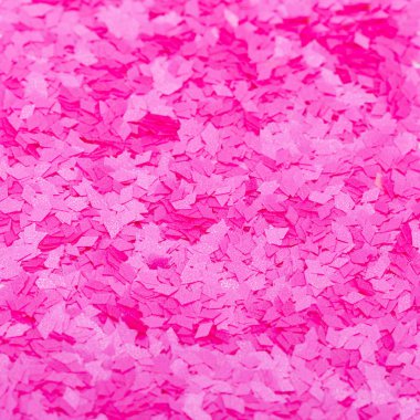 pembe parlak doku, payetler ile arka plan bulanıklık.