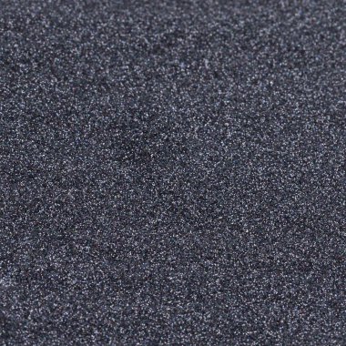 siyah parlak doku, payetler ile arka plan bulanıklık.