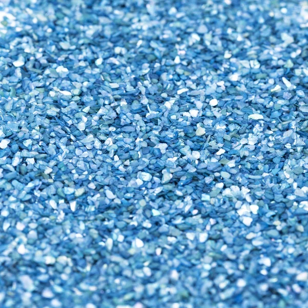 Textura brillante azul, lentejuelas con fondo borroso — Foto de Stock