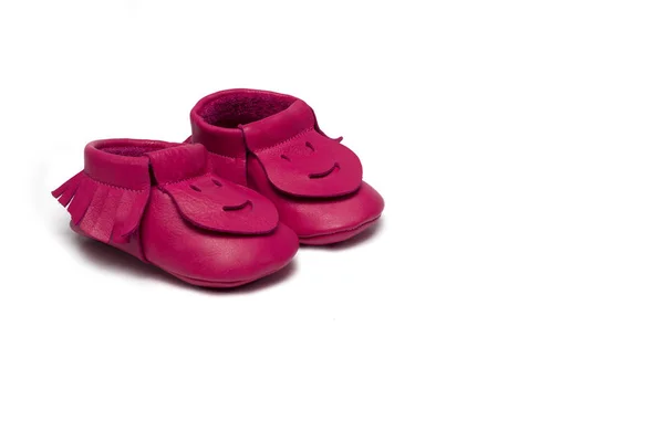 Childs dark pink booties on a white background — Stock Photo, Image