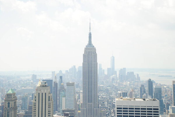 Empire state building centered and Manhattan behind