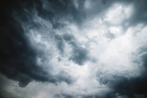 Dramatic cloudscape texture. Dark heavy thunderstorm clouds before rain