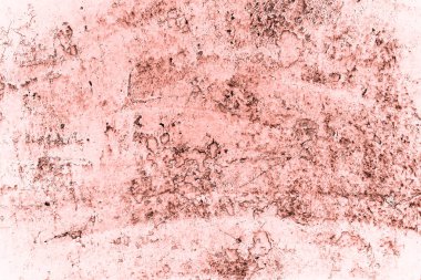 Vintage pink background. Rough painted wall of living coral color. Imperfect plane of beige colored. Uneven old decorative toned backdrop of beige tint.