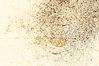 Vintage yellow background. Rough painted wall of aspen gold color. Imperfect plane of golden colored. Uneven old decorative toned backdrop of yellow tint. 