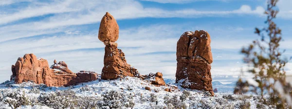 Balanced Rock Trail at Arches National Park with Snow in Winter