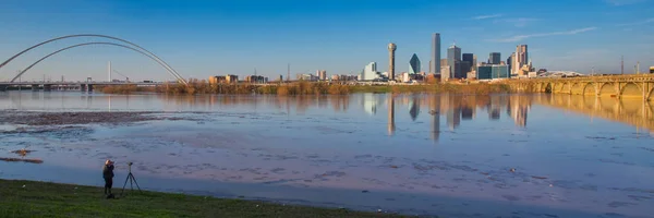 Photographer Taking Pictures of Dallas Skyline Reflection on Tri