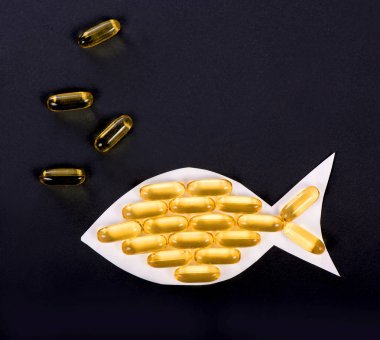 Balık şekilli morina yağı kapsülleri, Omega 3, D vitamini.