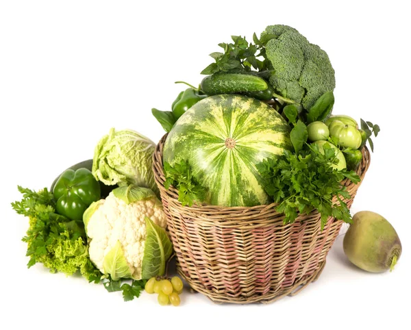 Green vegetables in wicker basket — Stock Photo, Image