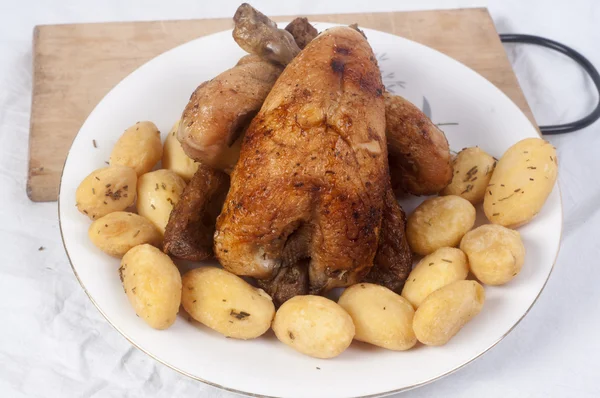Chicken roasted and potatoes — Stock Photo, Image