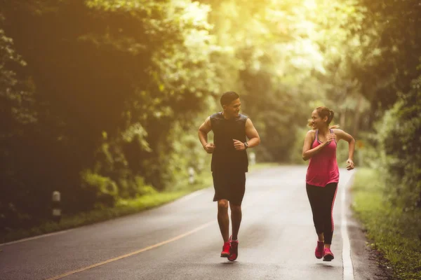 Couples Take Vacations Jogging Forest Integrity Refreshing — Stock Photo, Image