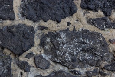 Taş duvar dokusunun soyut arkaplanı