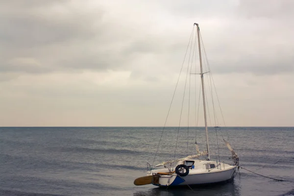 Small yacht at sea