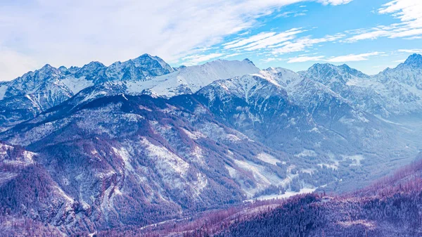 Surreal mountain landscape, purple mountains covered with snow