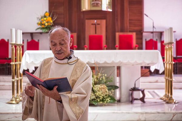 AMADORA/PORTUGAL - 29 AUG/15 - Father  in the local church
