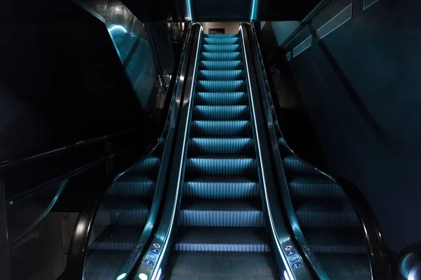 Escalators with blue light — Stock Photo, Image