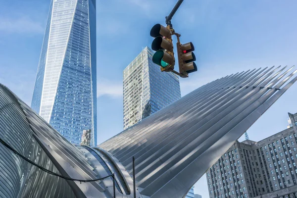 Traffic signs in New York seen from below.