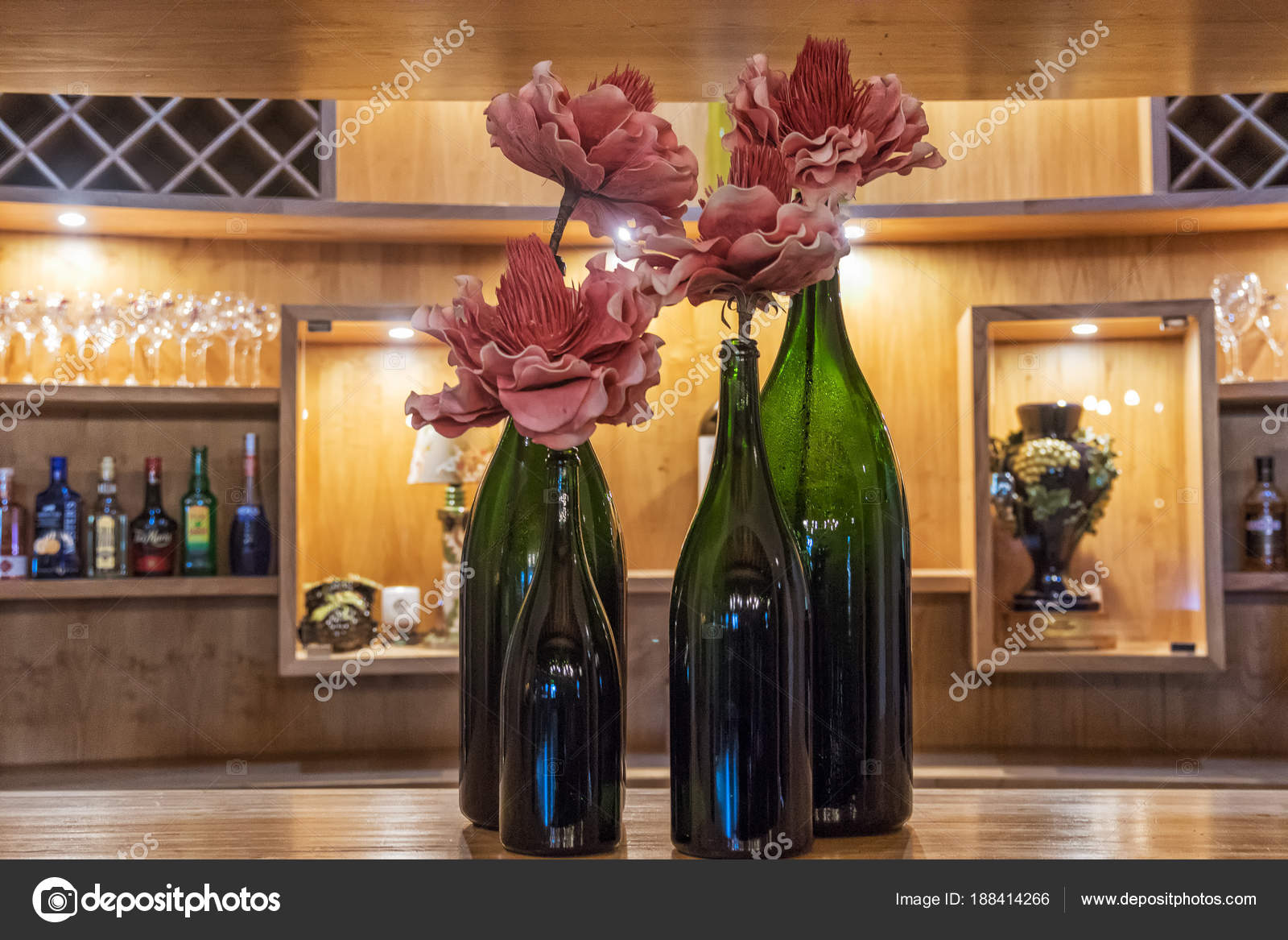 Giant Wine Bottles With Roses On Top Of Wooden Balcony Decorative