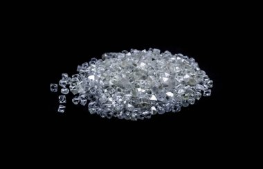 Raw diamonds isolated on black background. clipart