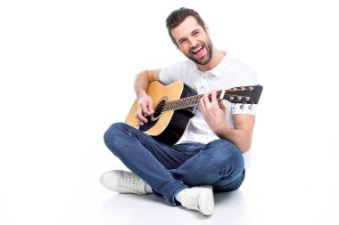 Young man with guitar clipart