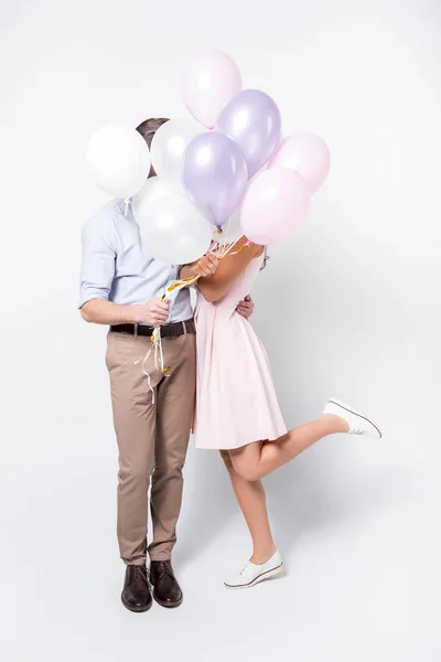 Couple with air balloons — Stock Photo, Image