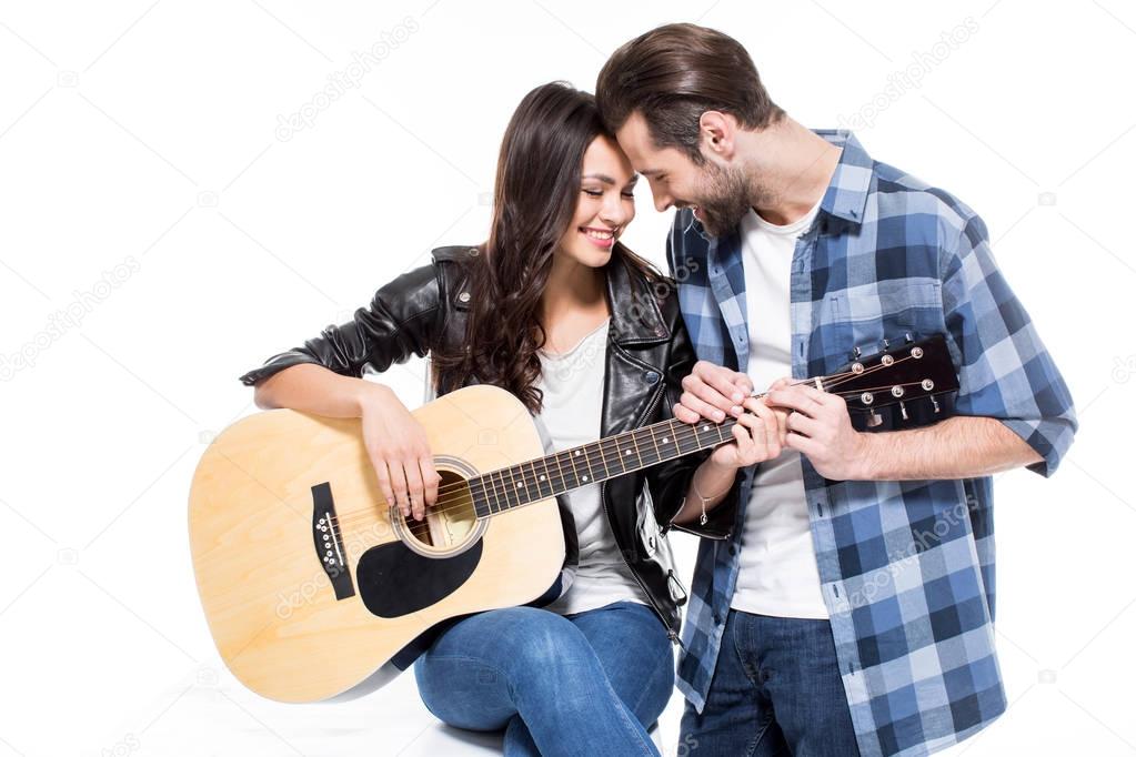 Young couple with guitar