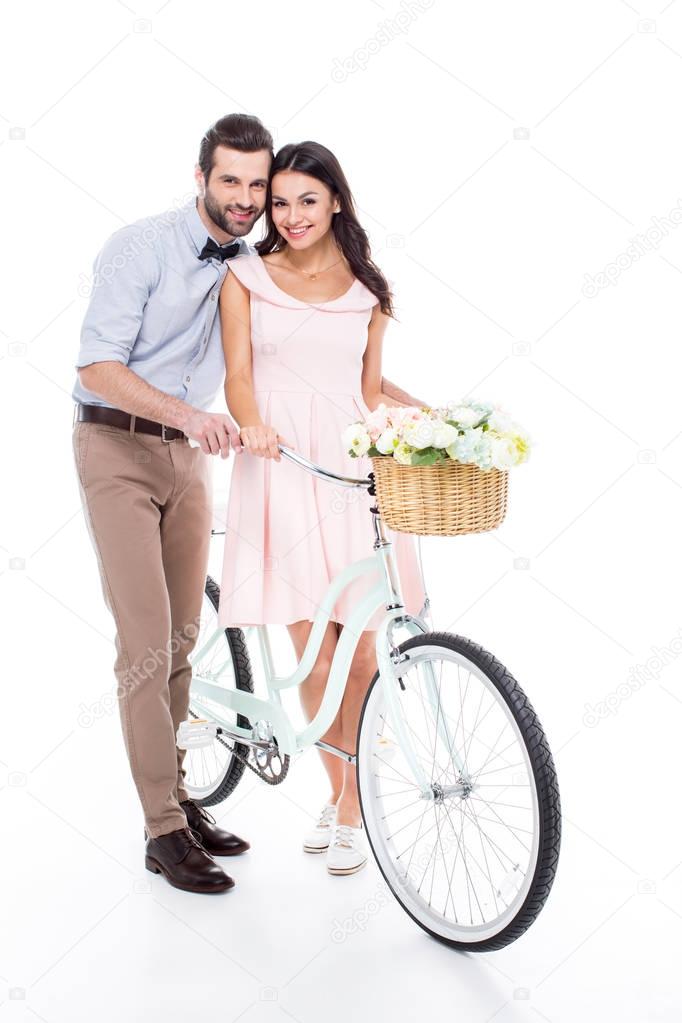 Young couple with bicycle 